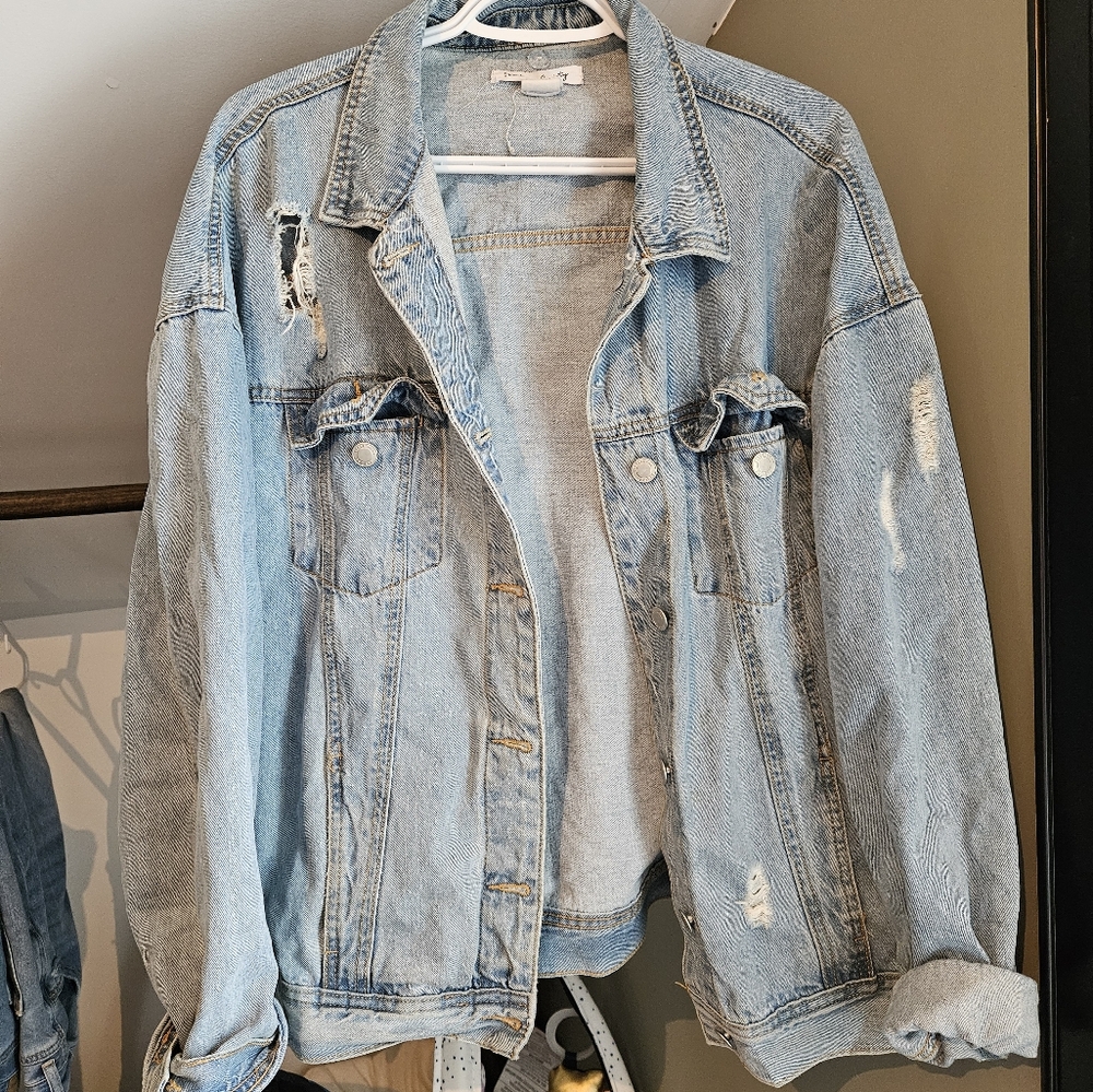 Distressed jean jacket